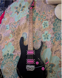 Ibanez RG 120 modded with invader pickups and pink accents