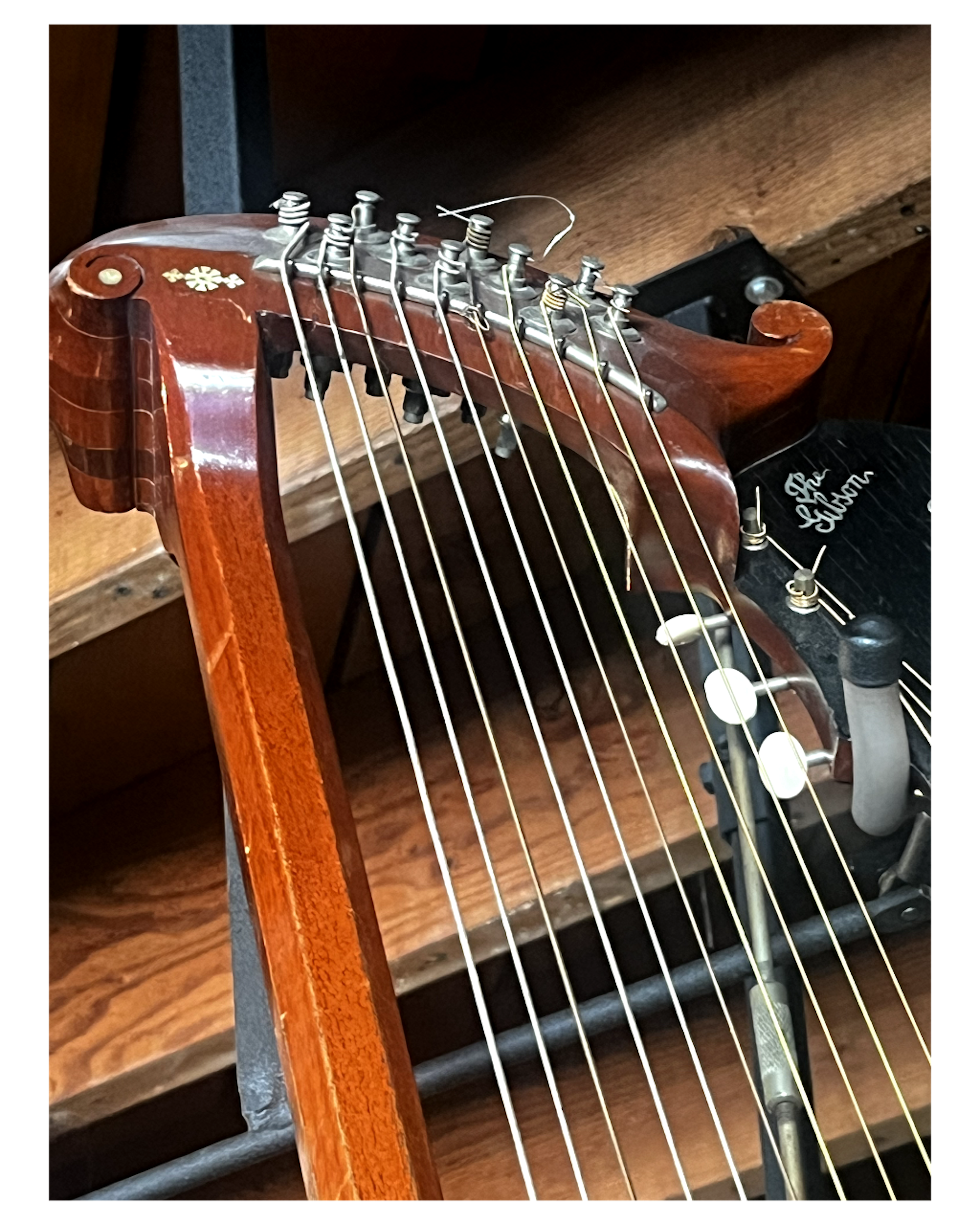 listings/211/images/1752270021700-1918-Gibson-style-Harp-Guitar-003.png